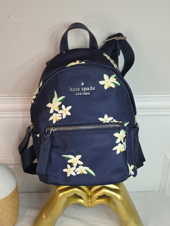 kate spade Handbags - Kate Spade New York
CHELSEA ORANGE TOSS MINI BACKPACK